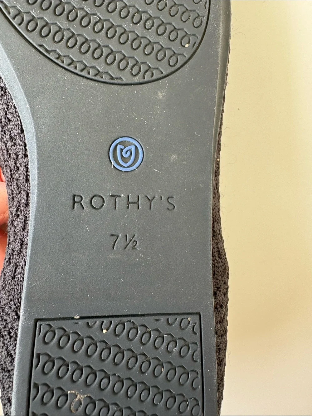 Rothy's Black Knit Ballet Flats with Blue Heel Trim. Womens size 7.5